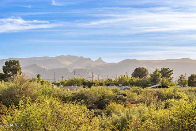 a view of mountain with sunset