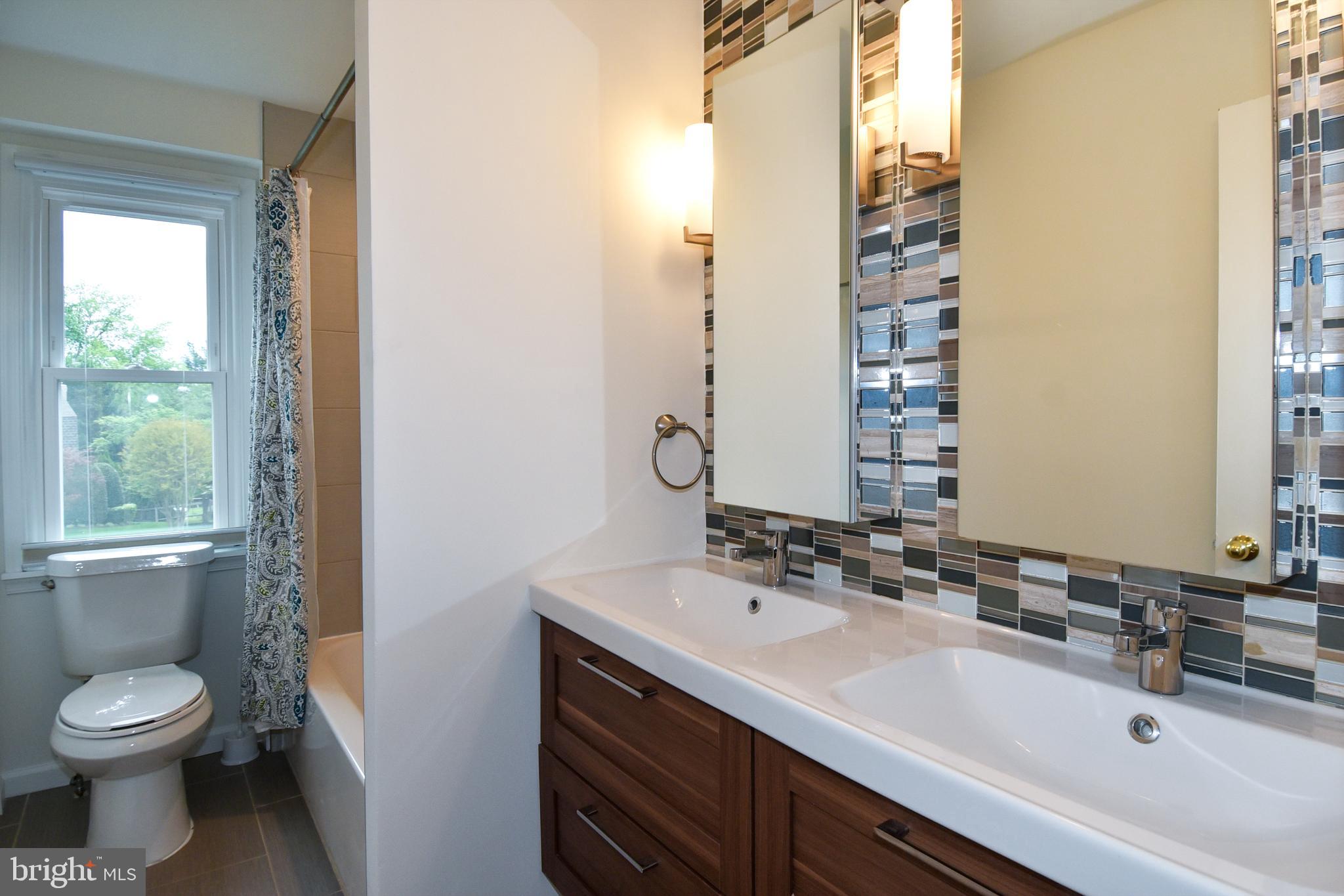 6608 Garrett Road Derwood, MD 20855 - Photo 24 of 38 Hall bath with dual vanity