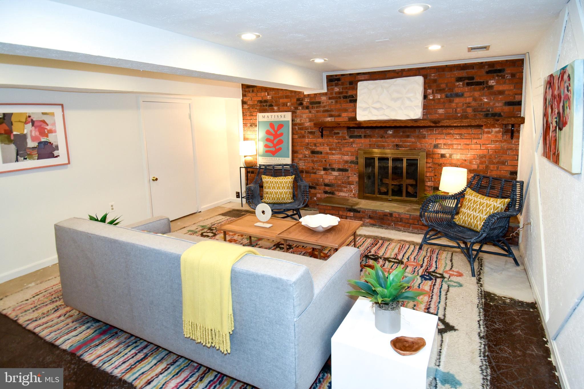 6608 Garrett Road Derwood, MD 20855 - Photo 28 of 38 Basement with fireplace
