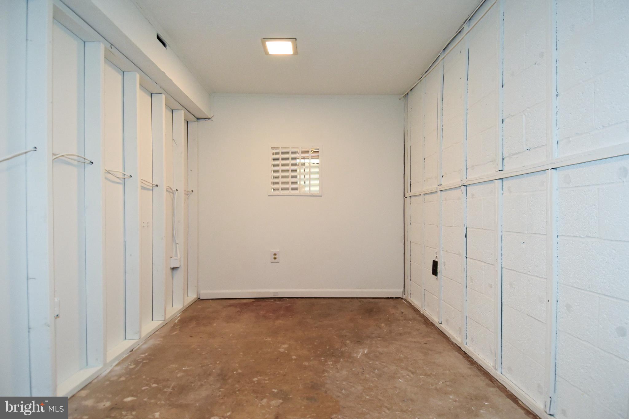 6608 Garrett Road Derwood, MD 20855 - Photo 32 of 38 Basement storage room