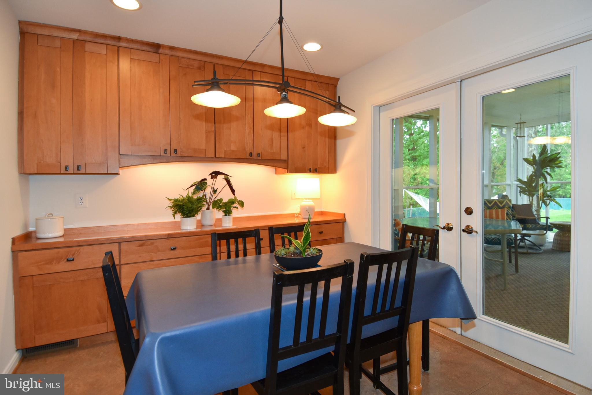 6608 Garrett Road Derwood, MD 20855 - Photo 7 of 38 Dining area leads onto screened patio