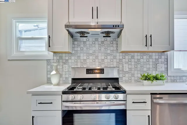 a view of a workspace with furniture and lamp