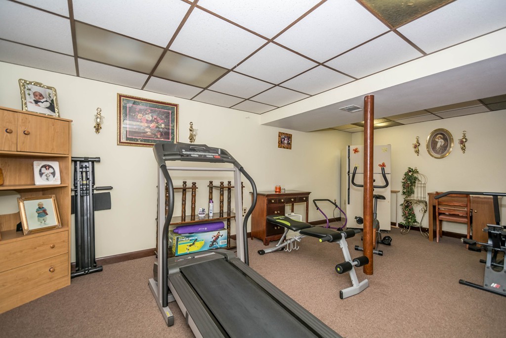 52 Westwind Road Lowell, MA 01852 - Photo 19 of 28 a view of a room with gym equipment