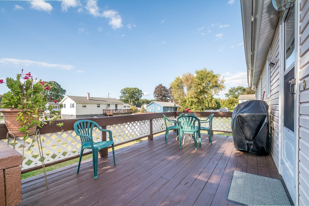 52 Westwind Road Lowell, MA 01852 - Photo 25 of 28 a view of a chairs and table in the patio