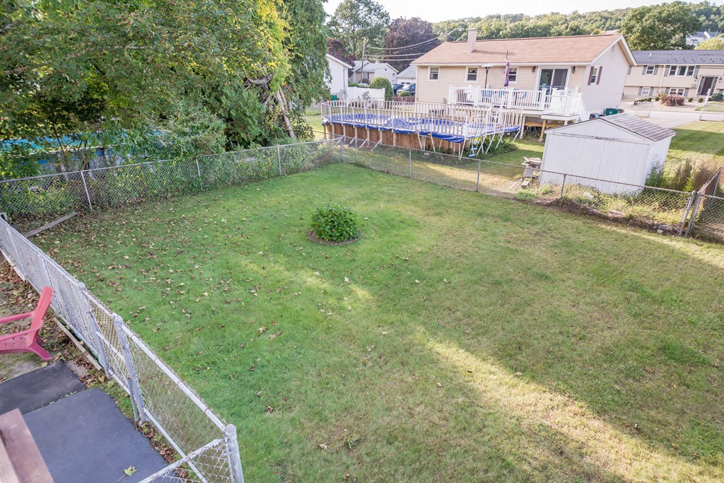 52 Westwind Road Lowell, MA 01852 - Photo 26 of 28 a view of a house with a big yard