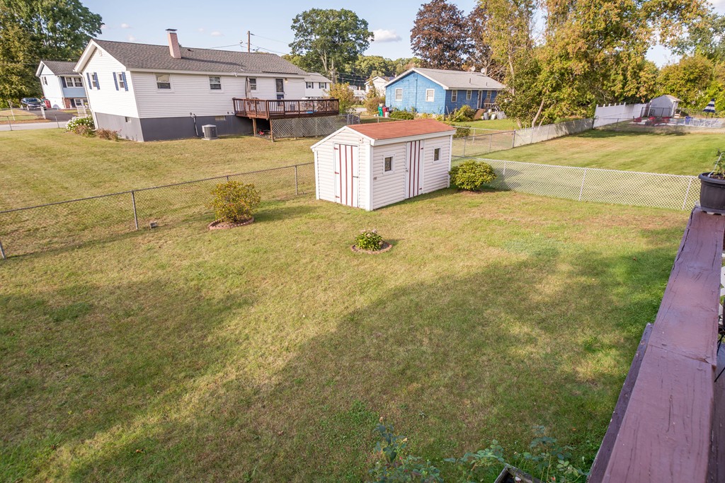 52 Westwind Road Lowell, MA 01852 - Photo 27 of 28 a view of a house with a yard
