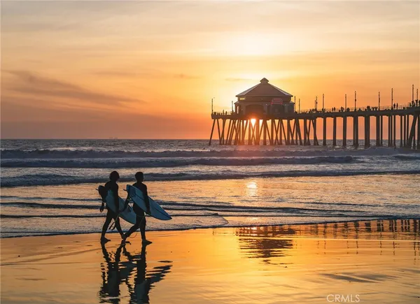 a view of a swimming pool with a table and chairs