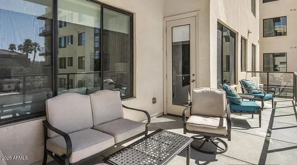 a building outdoor space with patio furniture