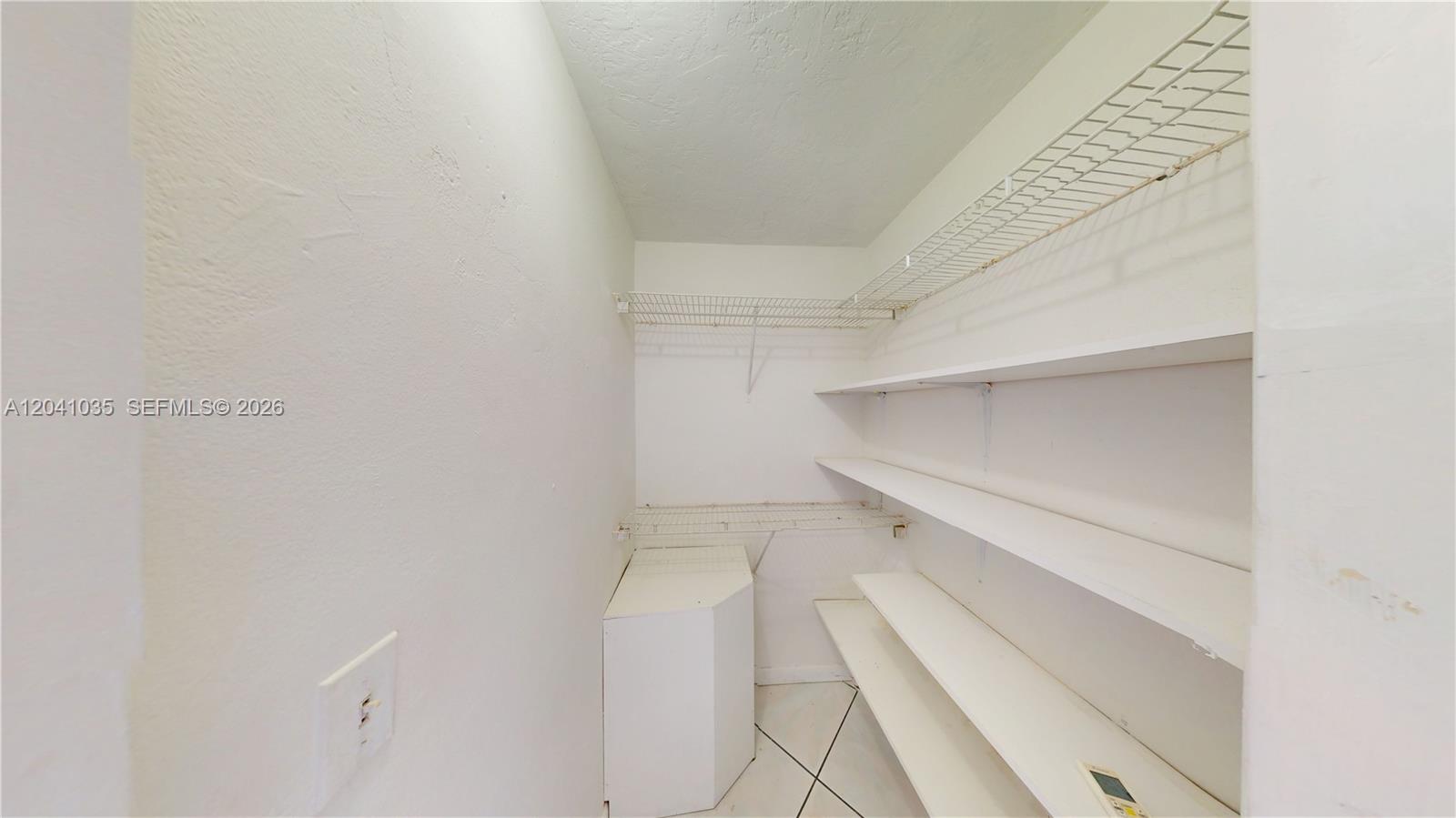 6811 Southwest 16th Street Miami, FL 33144 - Photo 21 of 21 a view of an empty walk in closet