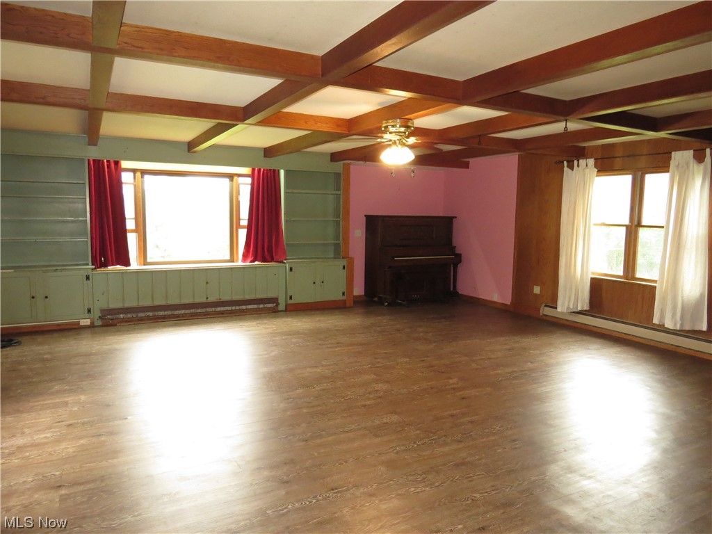 9797 Thwing Road Chardon, OH 44024 - Photo 14 of 35 Family room featuring coffered ceiling, and plenty of natural light