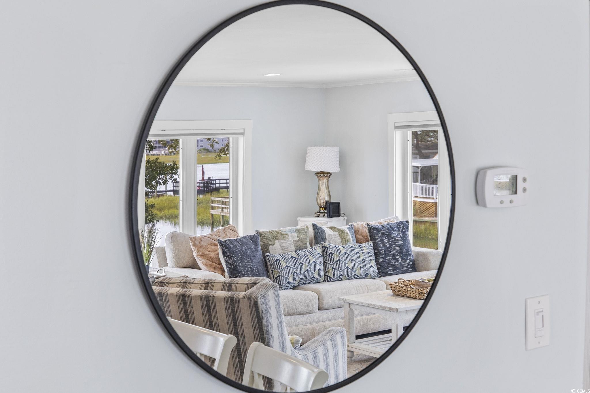 3184 State Rd S-26-816 Murrells Inlet, SC 29576 - Photo 15 of 40 Living room with crown molding and a wealth of natural light