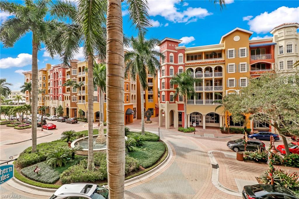 401 Bayfront Place, Unit 3208 Naples, FL 34102 - Photo 17 of 22 a front view of a multi story residential apartment building with a yard