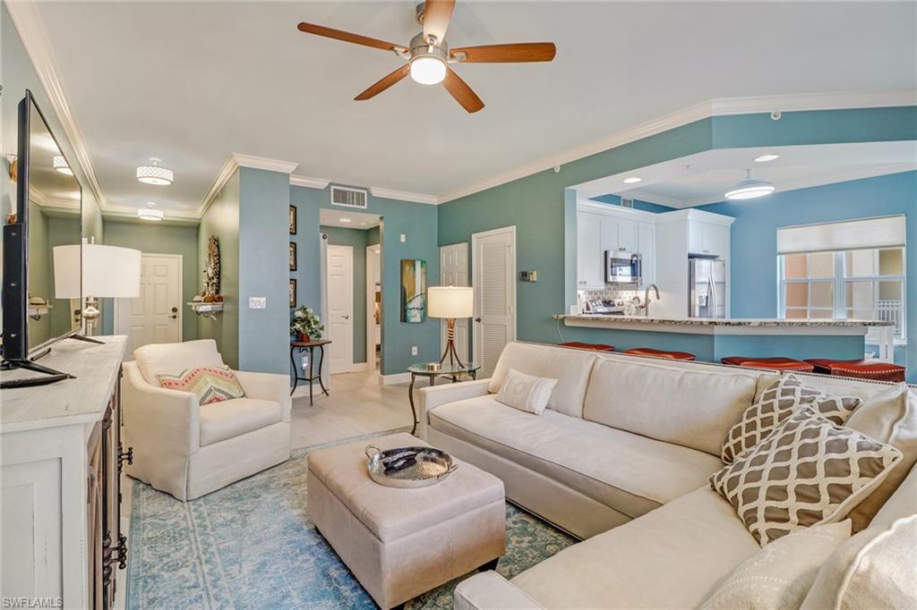 401 Bayfront Place, Unit 3208 Naples, FL 34102 - Photo 3 of 22 a living room with furniture and a rug