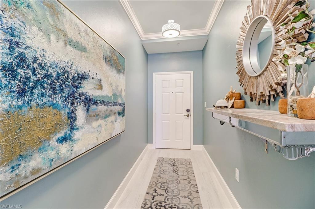401 Bayfront Place, Unit 3208 Naples, FL 34102 - Photo 10 of 22 a bathroom with a sink and a mirror