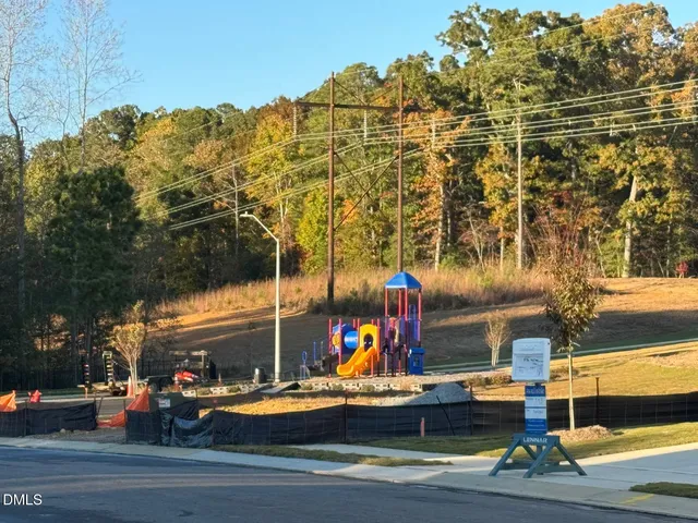 a view of outdoor space with seating area and swimming pool