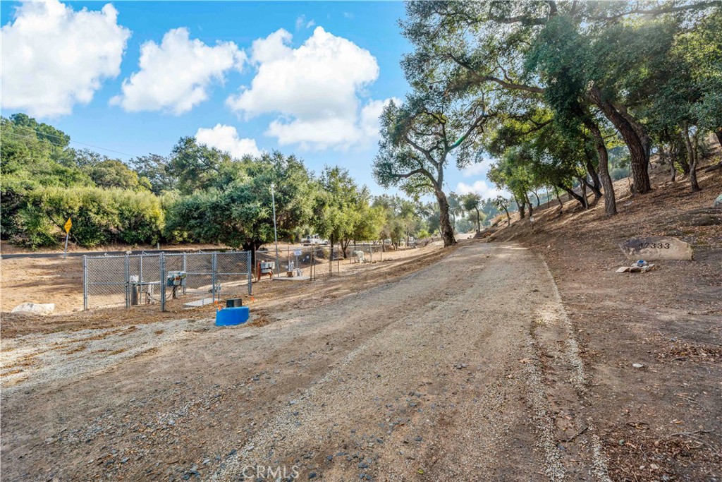 47333 Pala Road Temecula, CA 92592 - Photo 12 of 29 a view of a water fountain with large trees