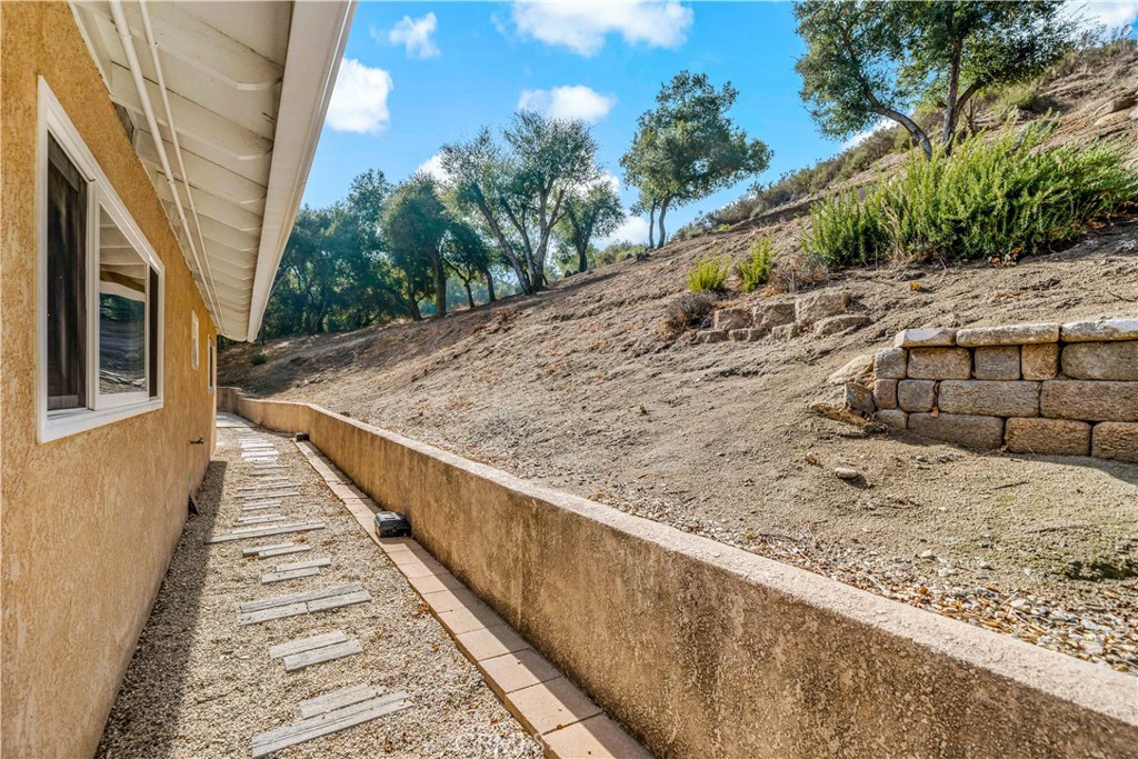 47333 Pala Road Temecula, CA 92592 - Photo 15 of 29 a view of a dry back yard with a barn