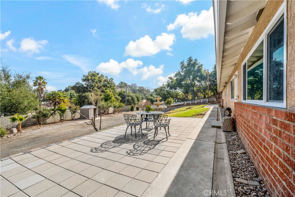 47333 Pala Road Temecula, CA 92592 - Photo 17 of 29 a view of swimming pool with outdoor seating and plants