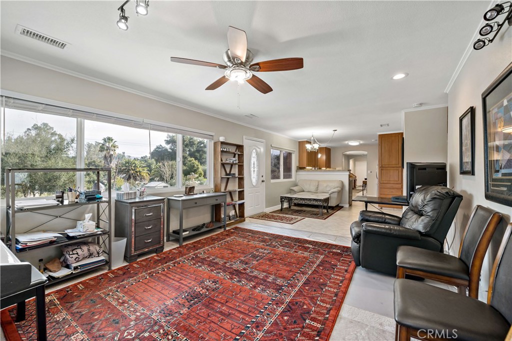 47333 Pala Road Temecula, CA 92592 - Photo 18 of 29 a living room with furniture and a large window