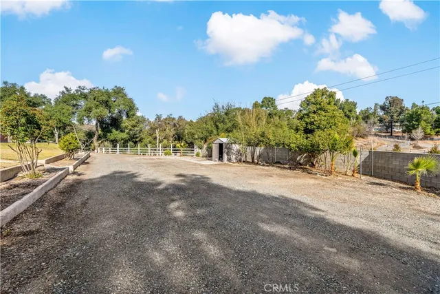 a view of a road with a building in the background