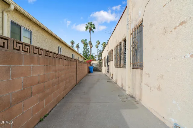 a view of a house with a small yard