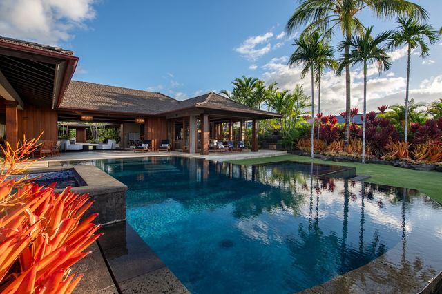a swimming pool view with a lake view