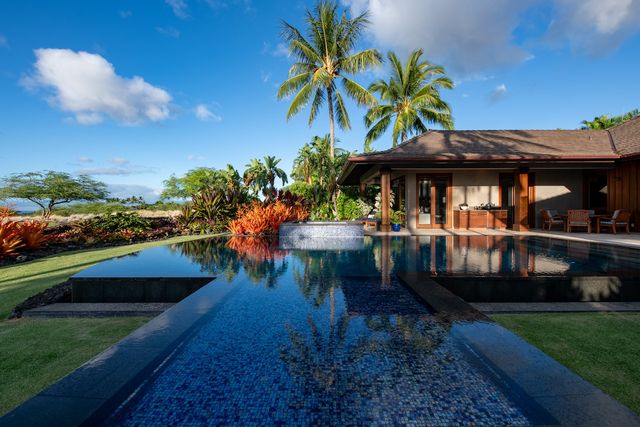 a view of a house with a garden