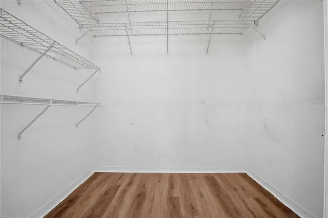 a view of a room with racks on the wall