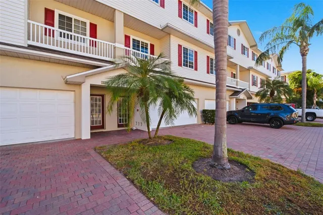 a front view of a building with garden