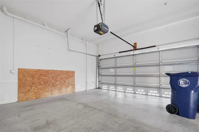 a view of a balcony with wooden fence and floor
