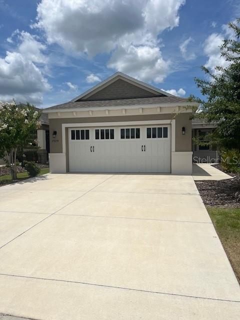 7978 Southwest 90th Terrace Ocala, FL 34481 - Photo 1 of 20 a front view of house with yard