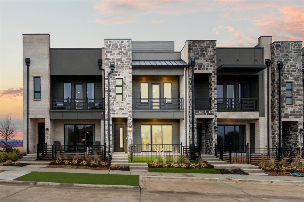 1237 Doris May Drive Allen, TX 75013 - Photo 2 of 19 Modern multi-level townhome featuring a stone and brick facade