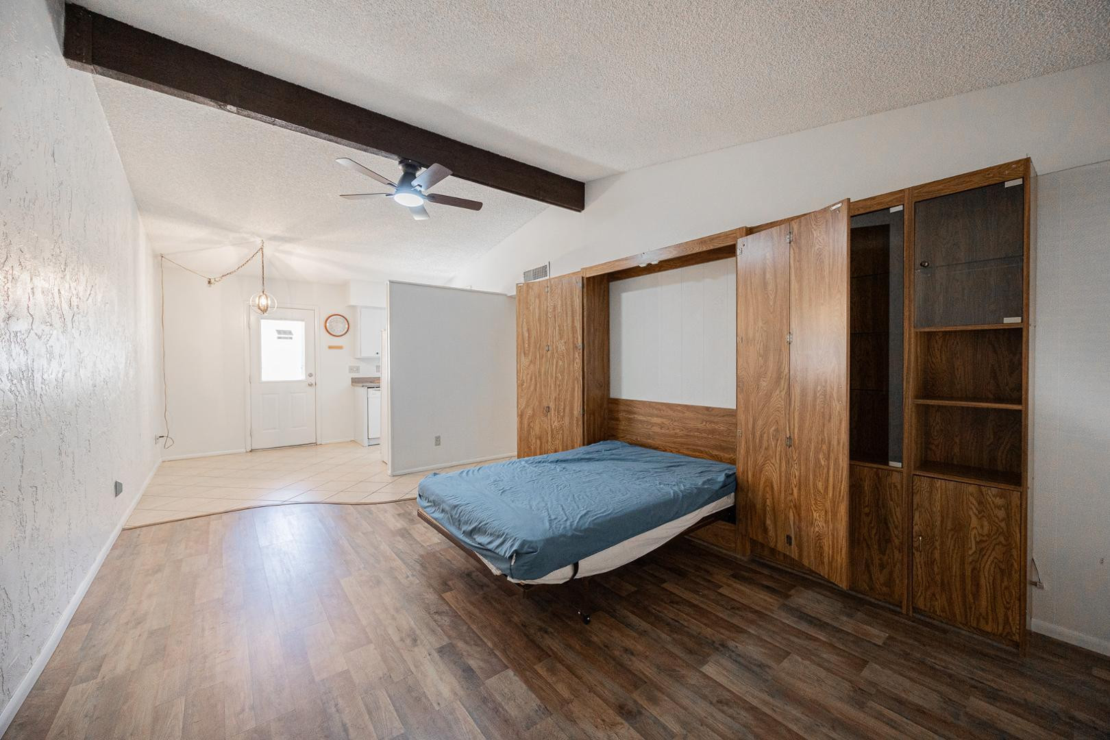 609 South Power Road, Unit 338 Mesa, AZ 85206 - Photo 12 of 24 a view of livingroom with hardwood floor and front door