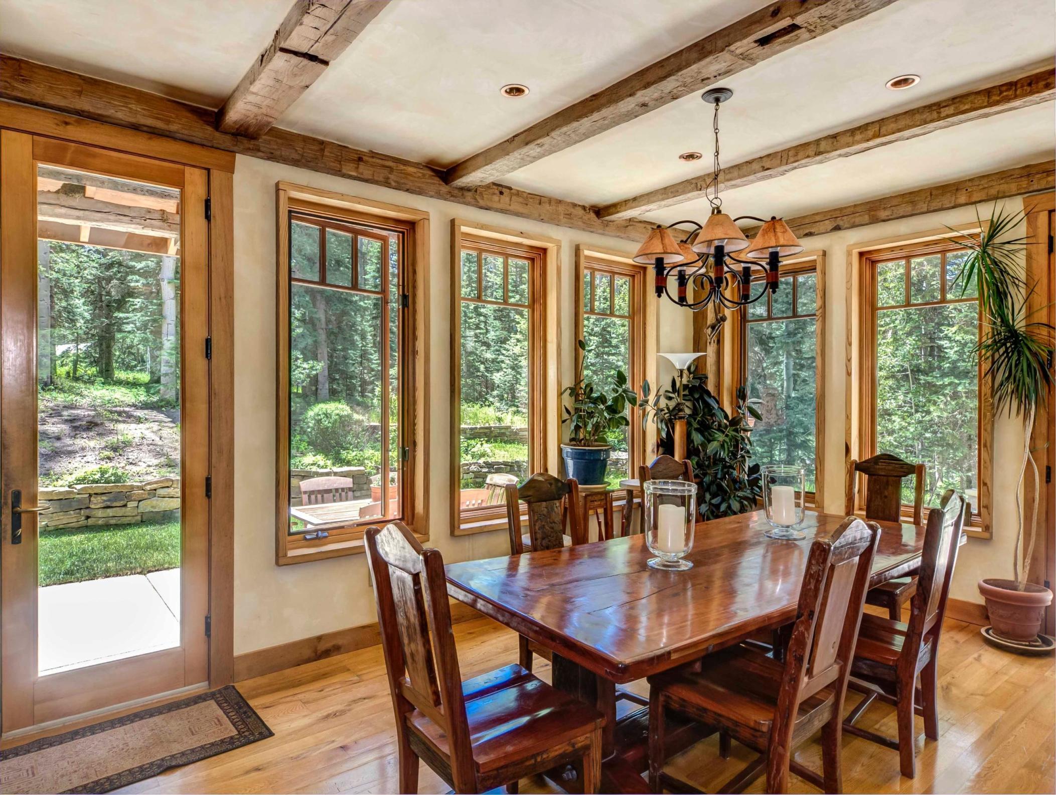 44 Spruce Way Telluride, CO 81435 - Photo 4 of 17 a view of a dining room with furniture window and outside view