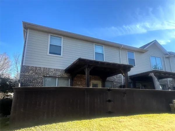 a view of house with outdoor space