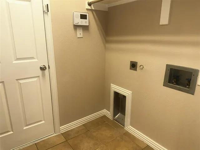 a view of a livingroom with wooden floor and a ceiling fan