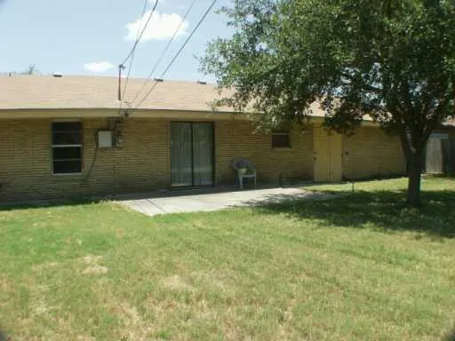 a front view of a house having yard