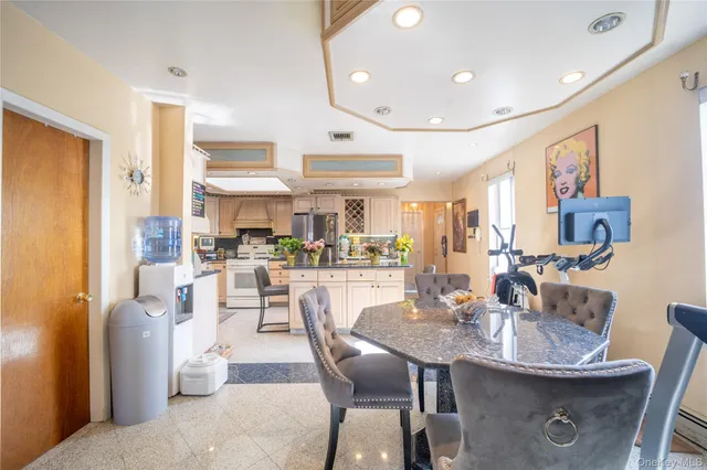 a view of a dining room with furniture
