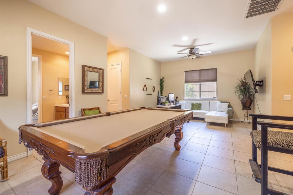 19506 Arcata Road Apple Valley, CA 92307 - Photo 20 of 34 Versatile bonus room ideal for a home office or game room setup
