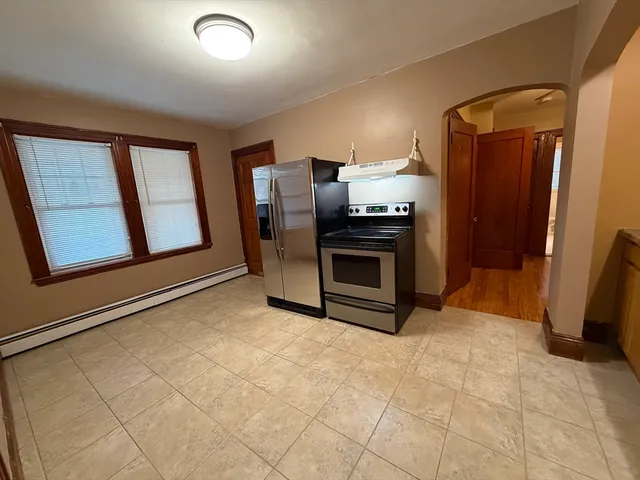 a view of kitchen and utility room