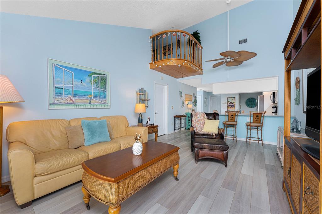5031 North Beach Road, Unit 222 Englewood, FL 34223 - Photo 12 of 64 a living room with furniture