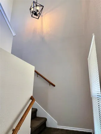 a view of entryway with stairs