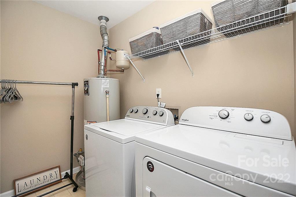 7589 Bluff Point Lane Denver, NC 28037 - Photo 33 of 36 a utility room with dryer and washer