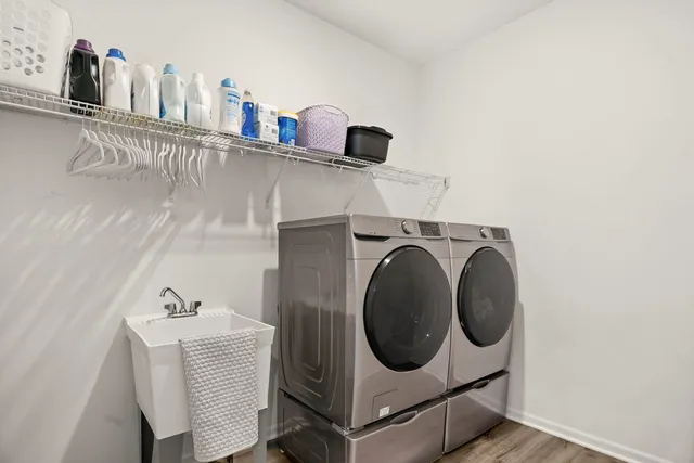a utility room with dryer and washer