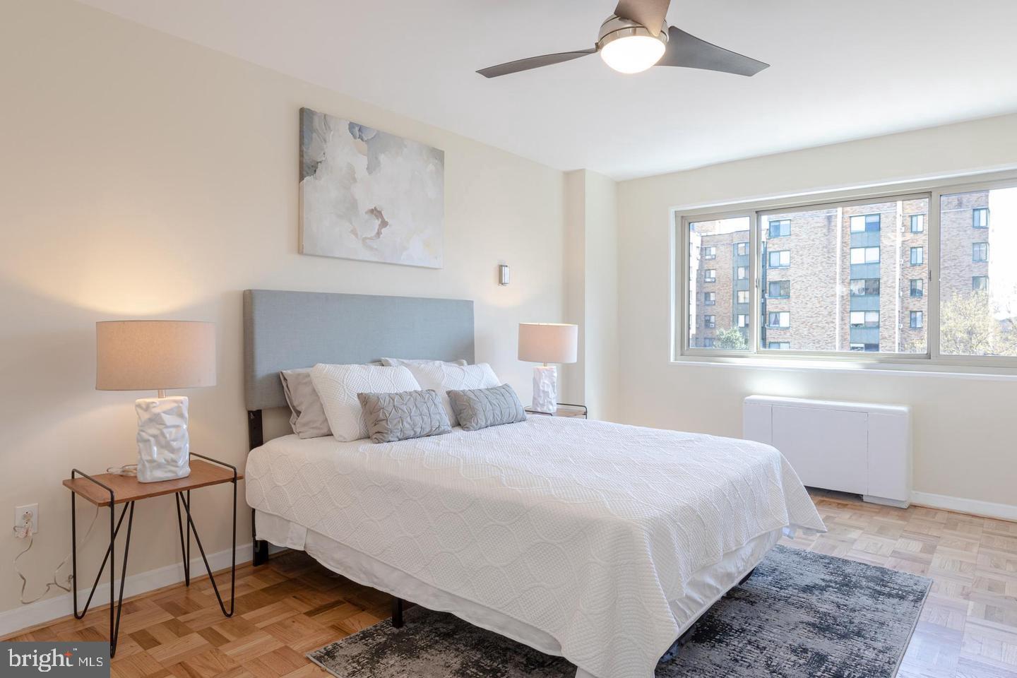 4600 Connecticut Avenue Northwest, Unit 601 Washington, DC 20008 - Photo 11 of 21 a bedroom with a bed and a window