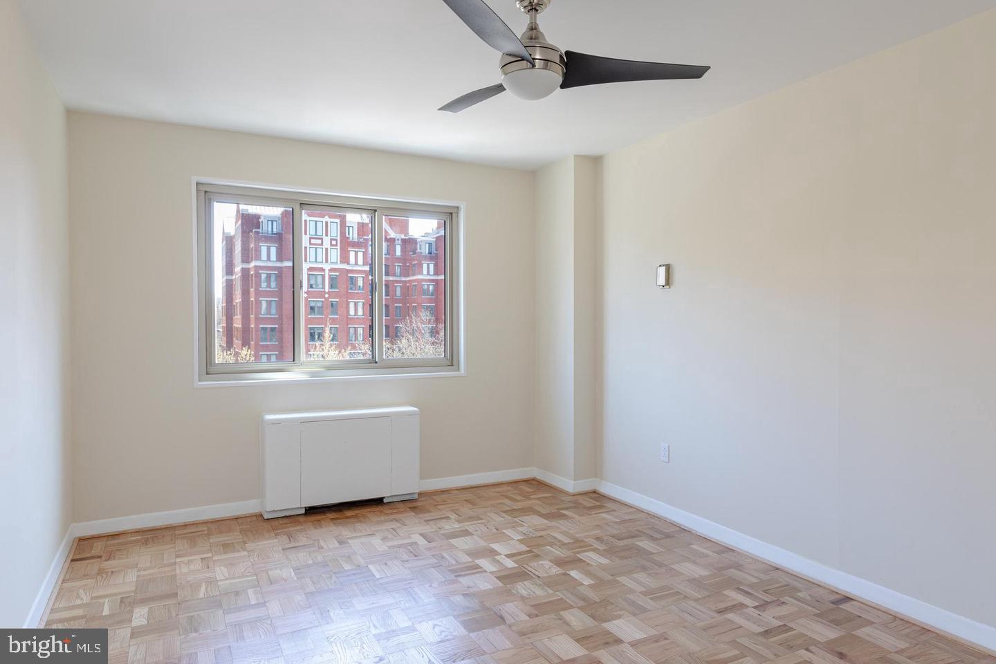 4600 Connecticut Avenue Northwest, Unit 601 Washington, DC 20008 - Photo 14 of 21 an empty room with windows