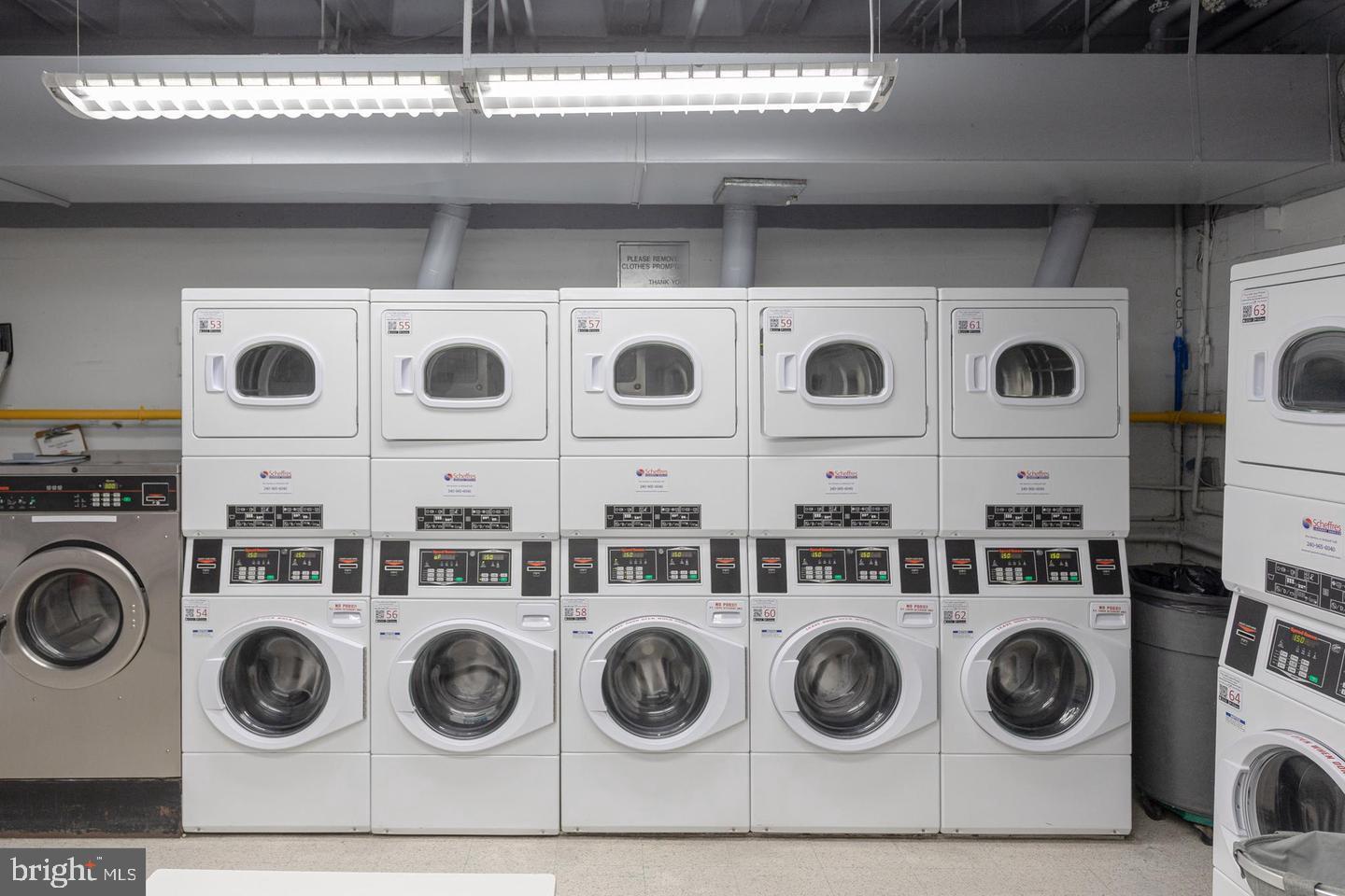 4600 Connecticut Avenue Northwest, Unit 601 Washington, DC 20008 - Photo 16 of 21 a utility room with stainless steel appliances and cabinets