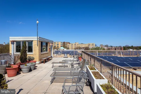 a view of balcony with furniture