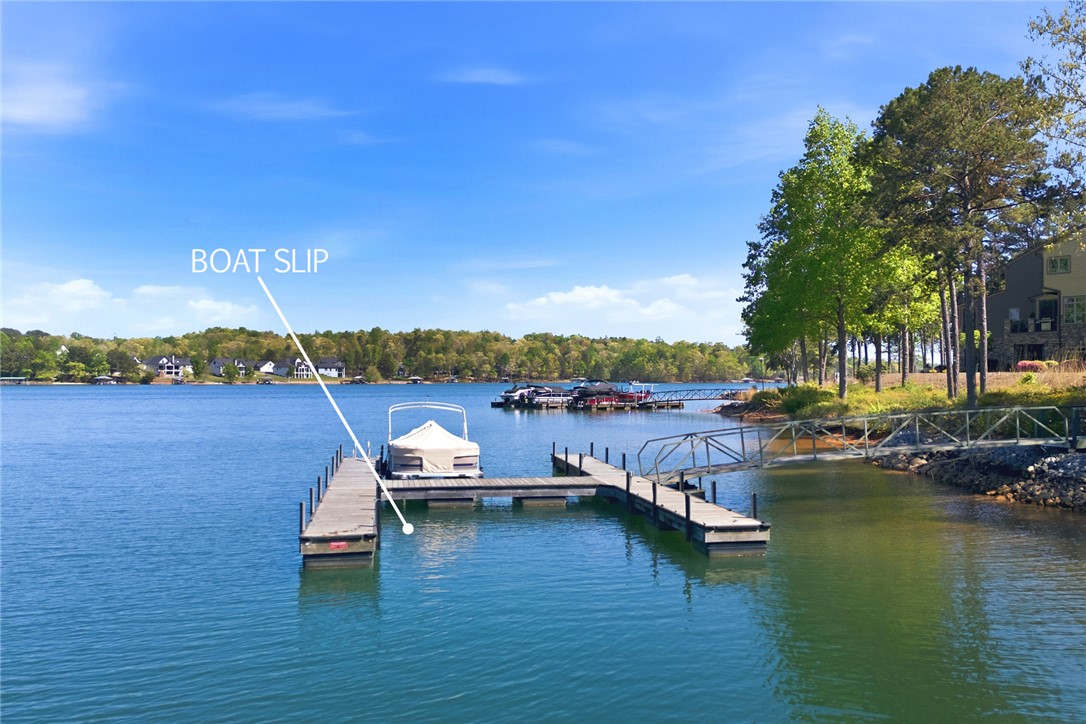 578 Sunset Point Drive West Union, SC 29696 - Photo 46 of 46 Boat Slip #56 transfers with the sale of the townhome.
