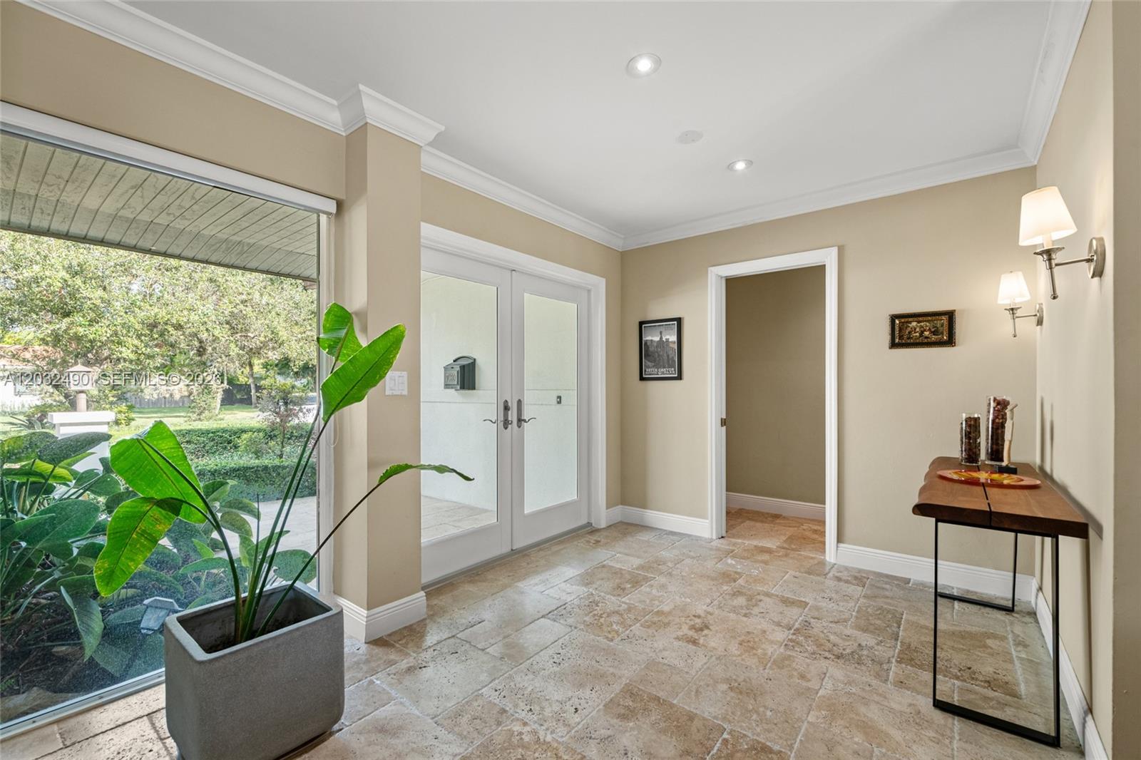 7360 Southwest 115th Street Pinecrest, FL 33156 - Photo 4 of 18 a view of a potted plant in a room